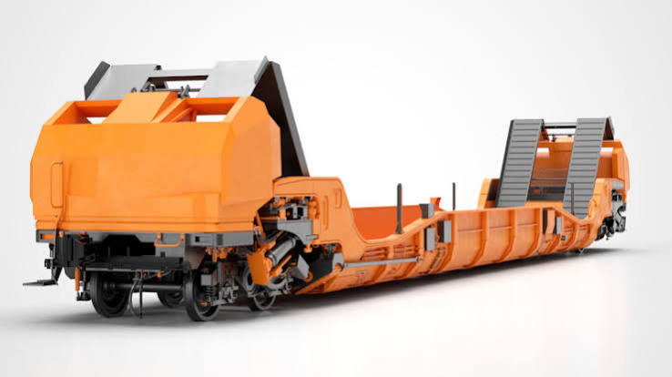 Interwagon orange rail wagon with integrated loading platform